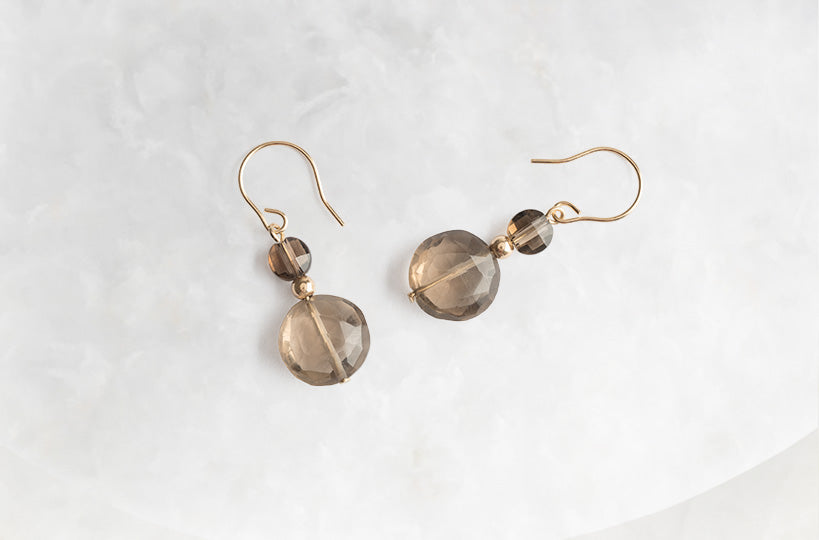 These 14k gold earrings with smoky quartz will empower you to take the first steps to living to the fullest. Get your pair today!
