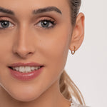 Gold titanium huggie earrings - Simply Whispers